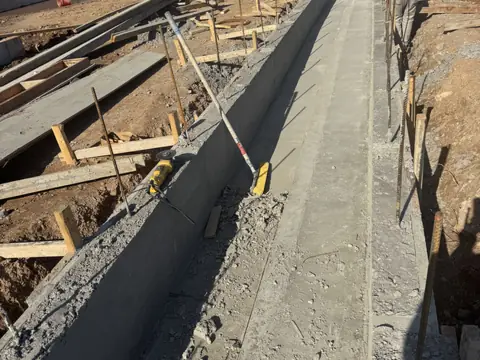 Curb forms. Executive Building Systems project.
