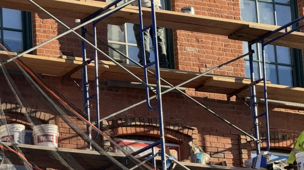 Façade repair from the swing stage, Peekskill, NY. Executive Building Systems project.