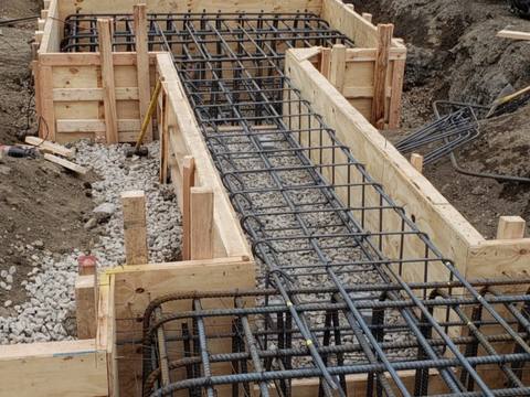 Footings under way. Executive Building Systems project.