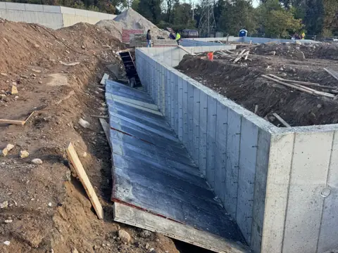 Waterproofed foundation wall. Executive Building Systems project.