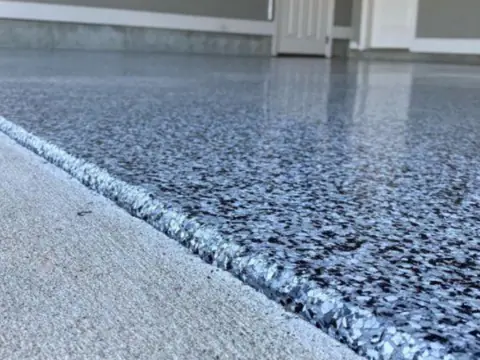 Terrazzo style epoxy edge. Executive Building Systems project.
