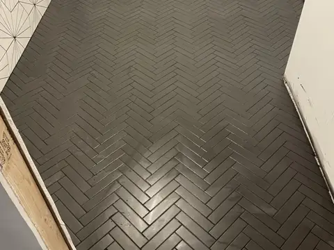 Herringbone tile ceiling. Executive Building Systems project.