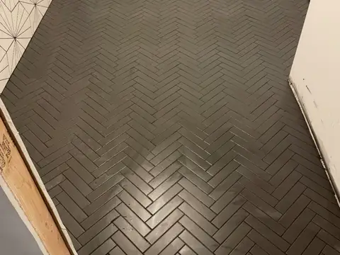 Herringbone tile detail. Executive Building Systems project.