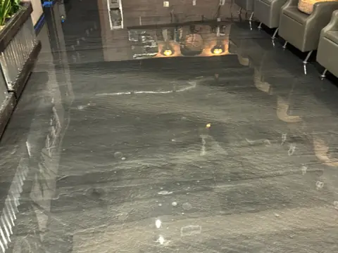 Polished floor lounge. Executive Building Systems project.