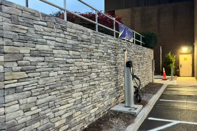 Stone retaining wall. Executive Building Systems project.