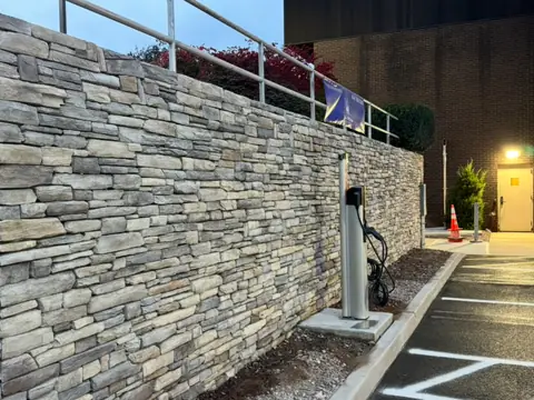 Stone retaining wall. Executive Building Systems project.