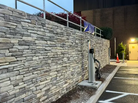 Stone wall, completed. Executive Building Systems project.