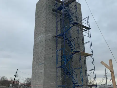 Pipe scaffold at height. Executive Building Systems project.