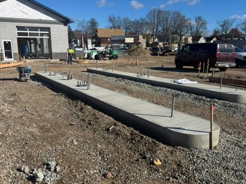 Curb and site work. Executive Building Systems project.