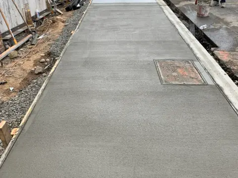 New sidewalk. Executive Building Systems project.