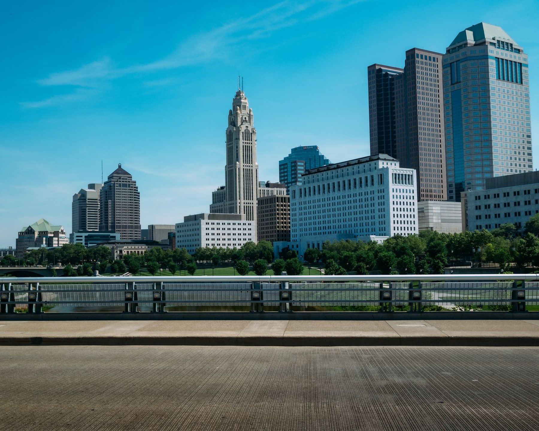 A city skyline under a blue sky