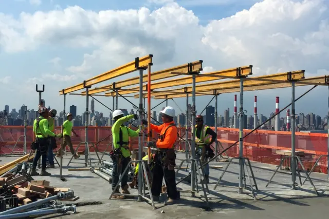 Crew shoring at height. Executive Building Systems project.