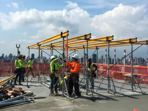 Crew shoring at height. Executive Building Systems project.